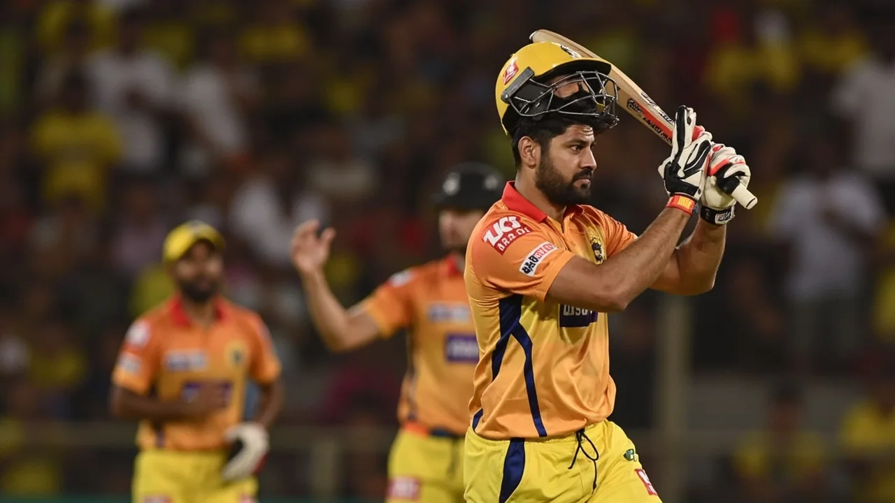 A medium tactical view of a domestic cricket team in a fielding huddle near the boundary rope, second editorial figure for the Shashank Singh Puducherry move report